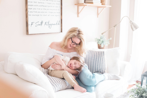 Mom sitting with daughter